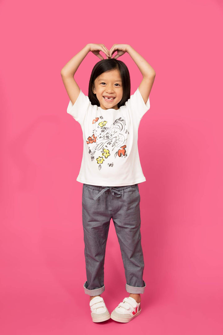 One of our favorite girls graphic tees, featuring a painted Firebird. Artwork inspired by Marc Chagall. Made from 100% organic cotton fabric, cut and sewn in LA. Unisex organic denim kids pants.
