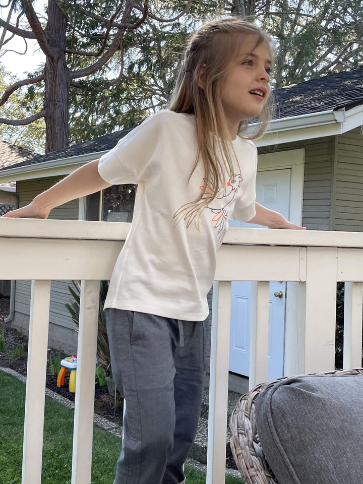 Firebird Kids girls graphic tees. Embroidered firebird, on 100% Peruvian organic cotton tee. Hip and Stylish. Cut, sewn and embroidered in NYC.