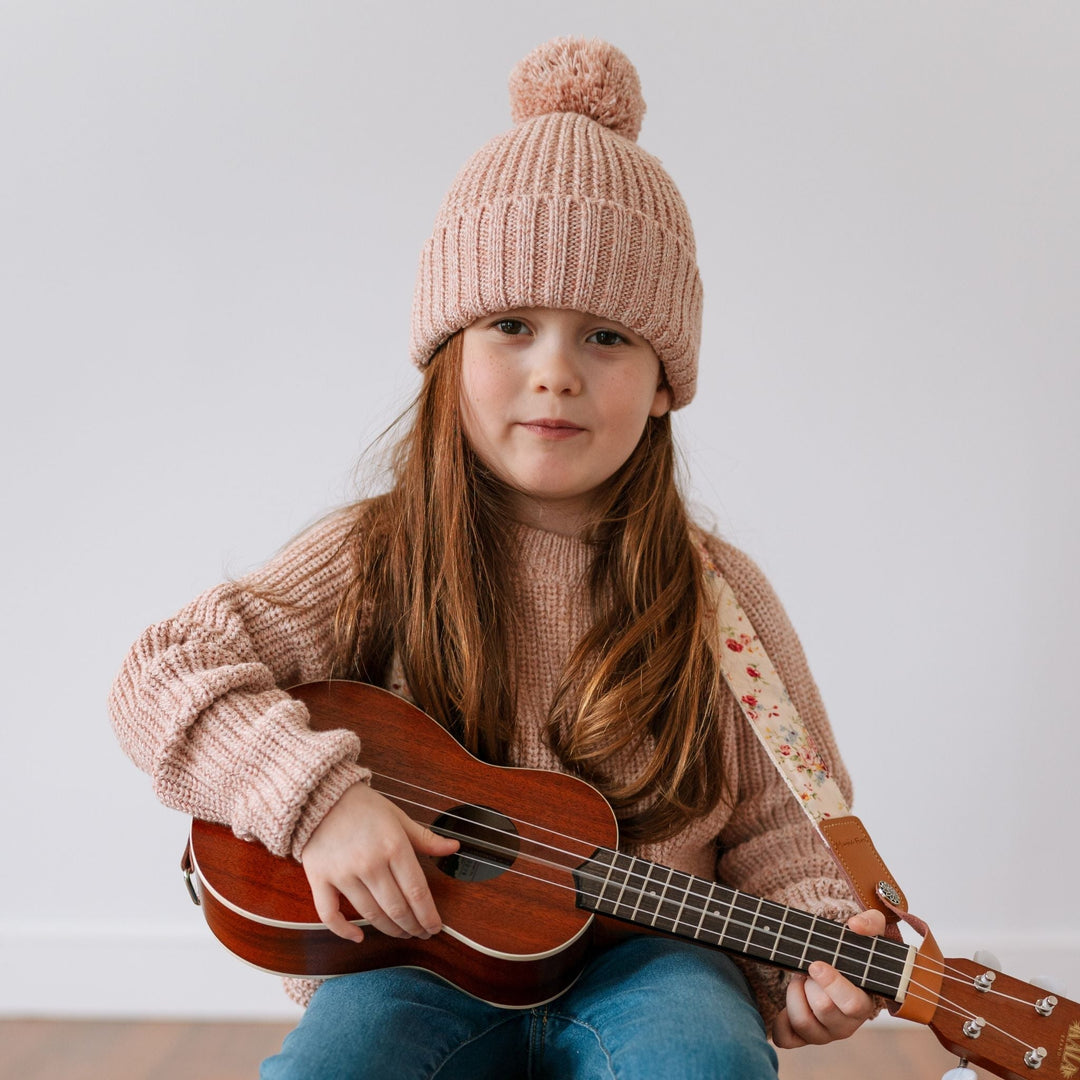 Girl wearing soft breathable knit clothing for sensitive skin by Firebird Kids