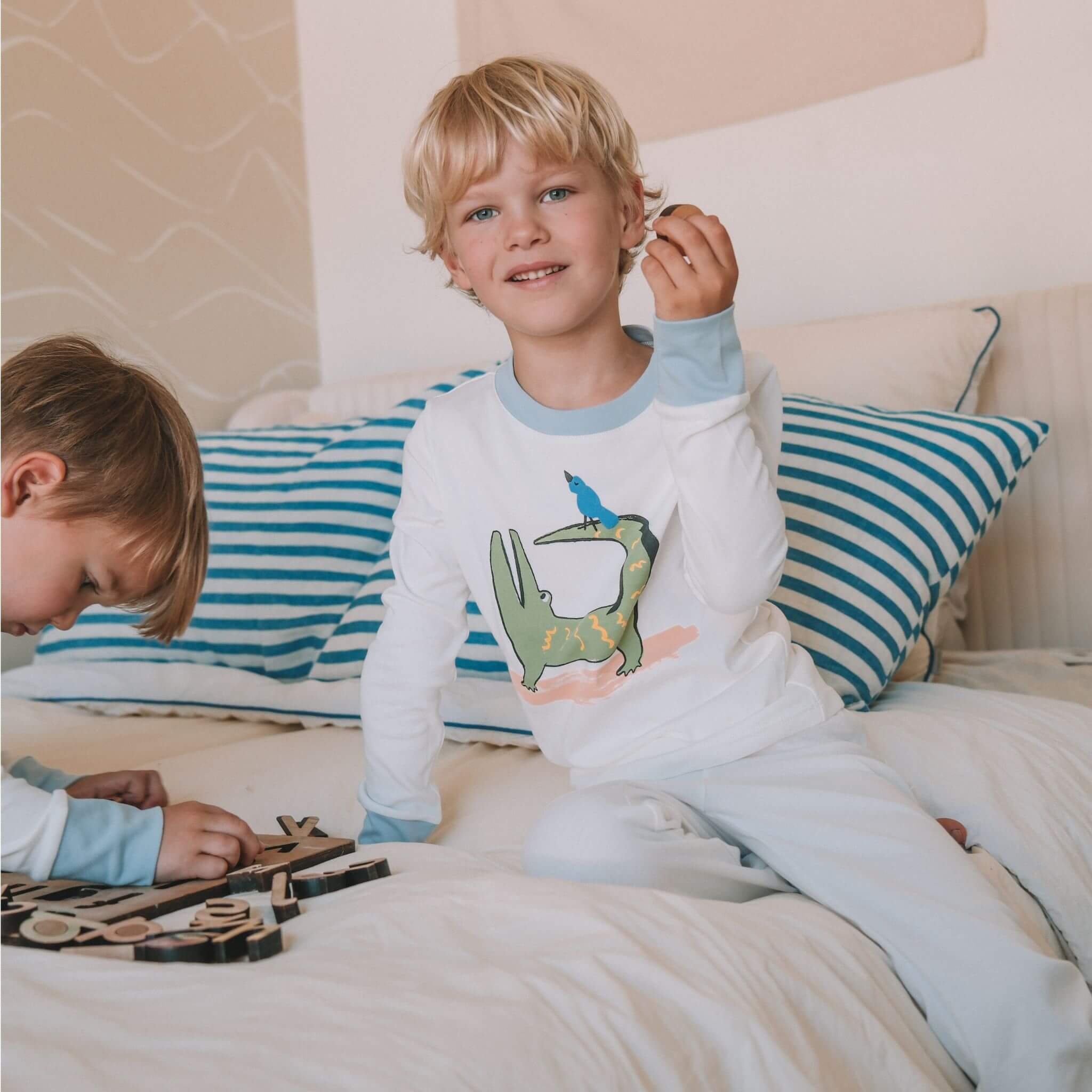 Firebird Kids Long Sleeve Pajamas, worn by a child.