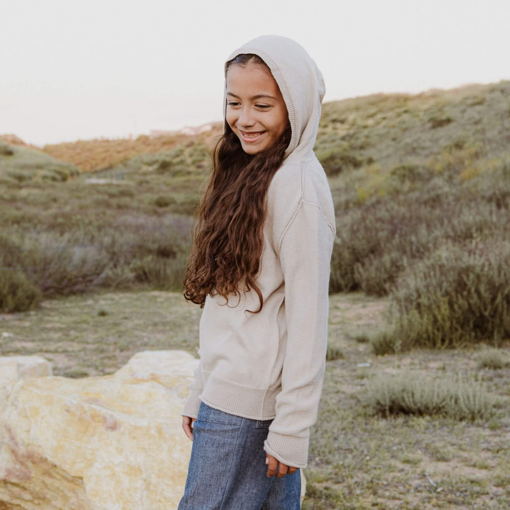 Firebird Kids Cashmere Blend Hoodie (Beige/Gray), worn by a child.