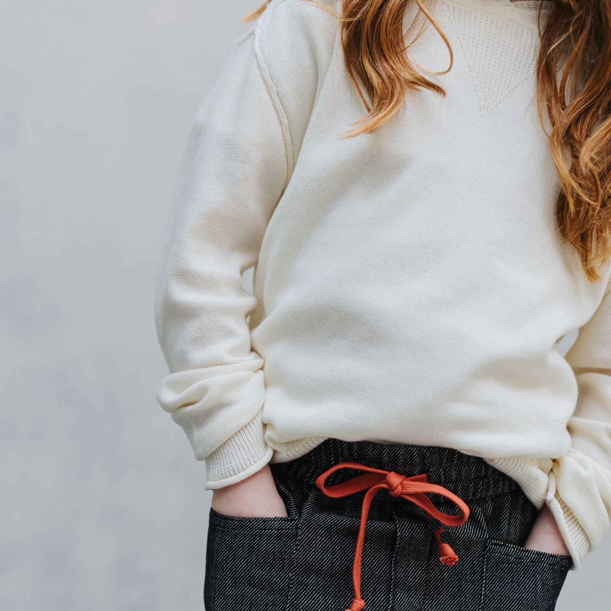 Front view of the Firebird Kids ivory cotton-cashmere hoodie sweater