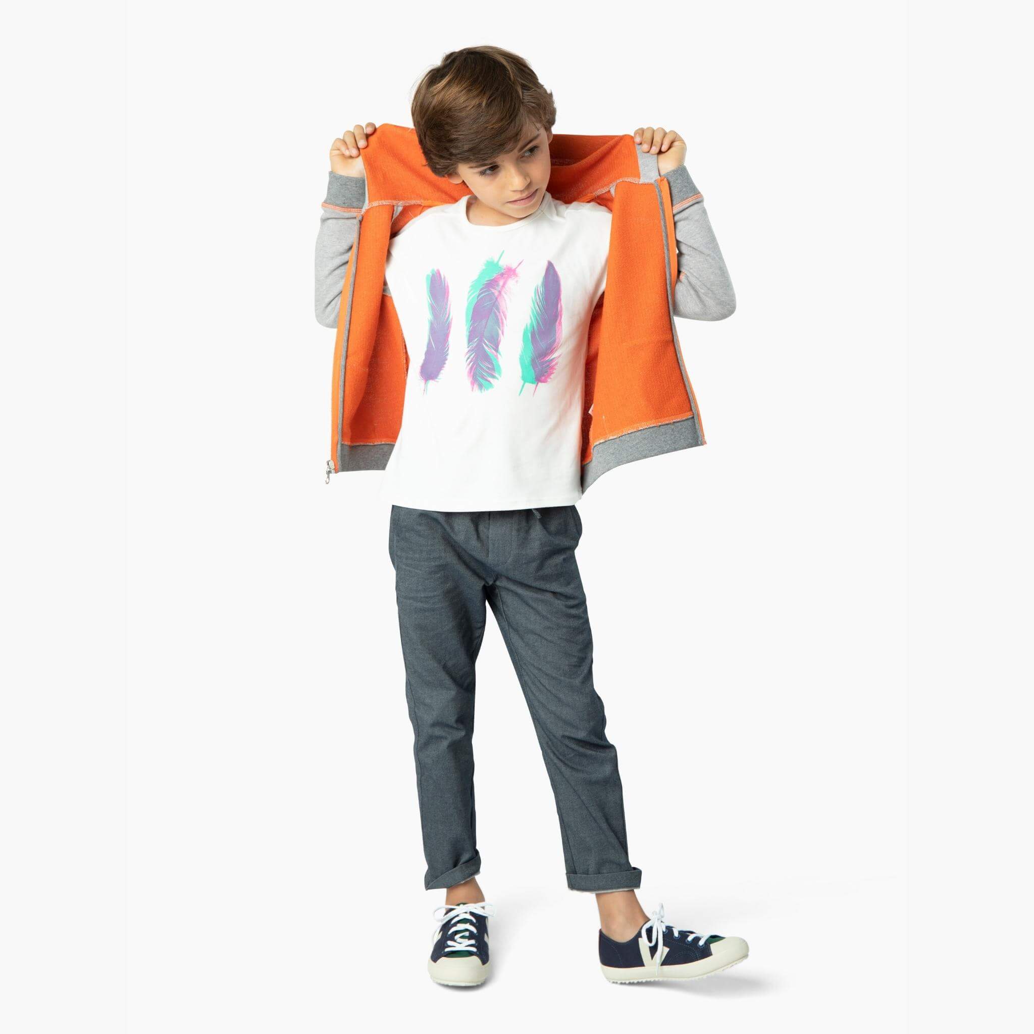 Boy wearing the perfect jean from our Kids Essentials collection: Soft Denim Pants in Dark Gray, made of 100% organic Japanese cotton for a comfortable, sustainable, and high-quality fashion choice