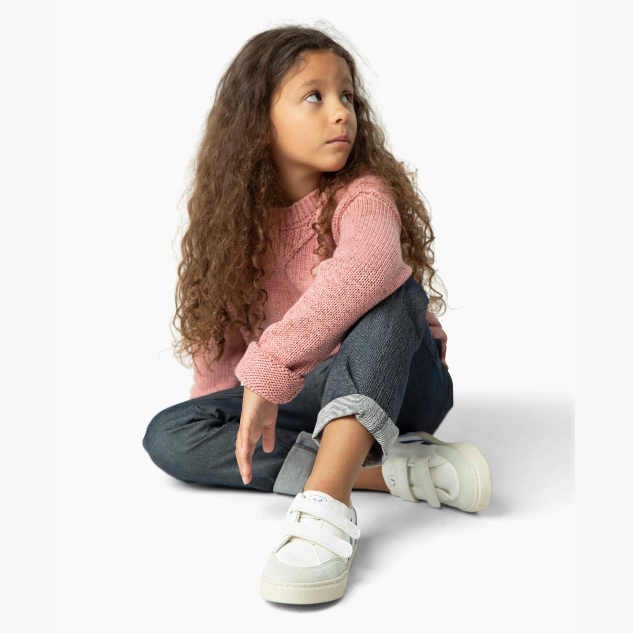 Girl wearing the perfect jean from our Kids Essentials collection. Soft Denim Pants in Dark Gray, cuffed for a polished yet hip look, made of 100% organic Japanese cotton